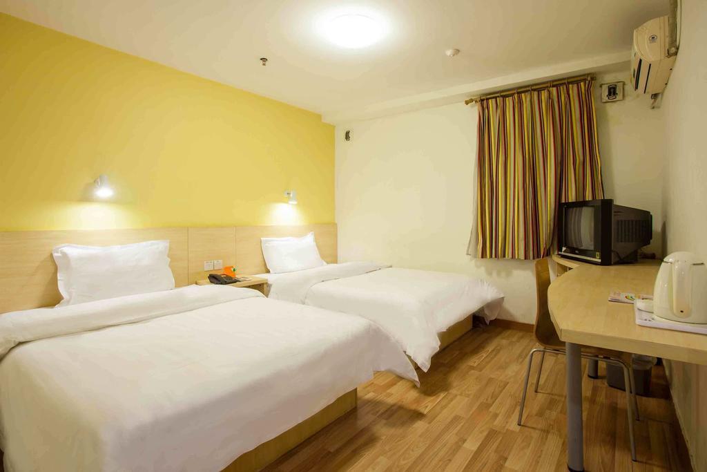 7 Days Inn Meizhou Jiangnan Kedu Commercial Plaza Habitación foto