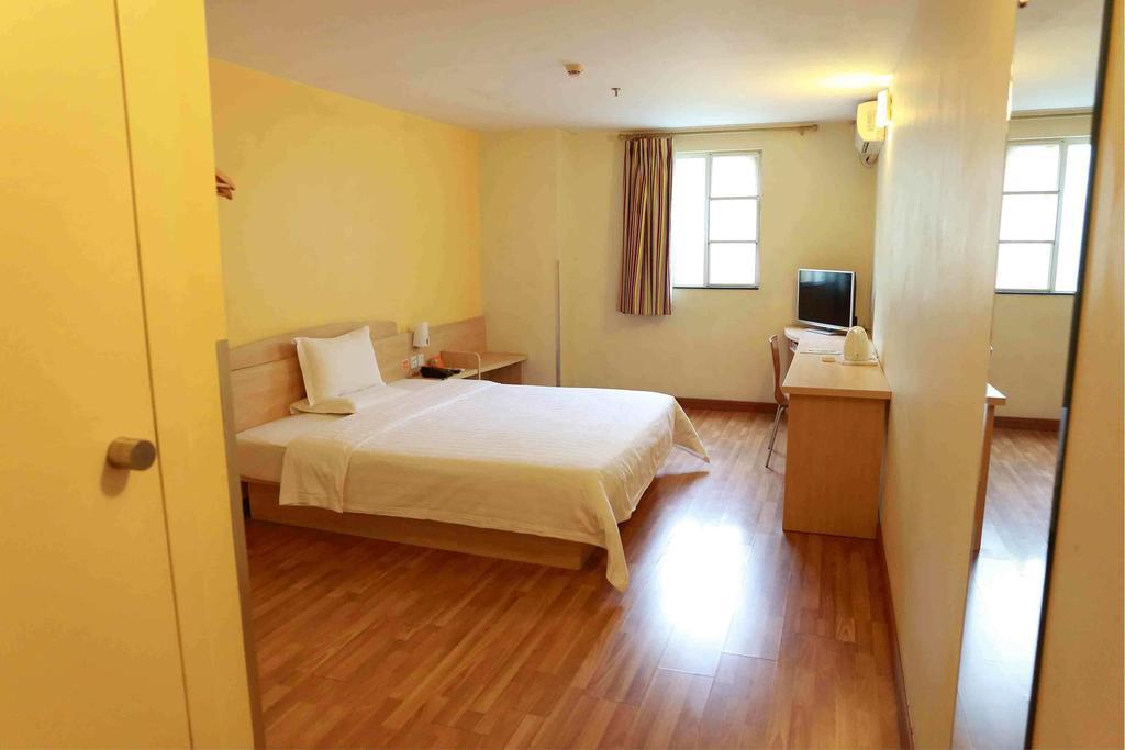 7 Days Inn Meizhou Jiangnan Kedu Commercial Plaza Habitación foto